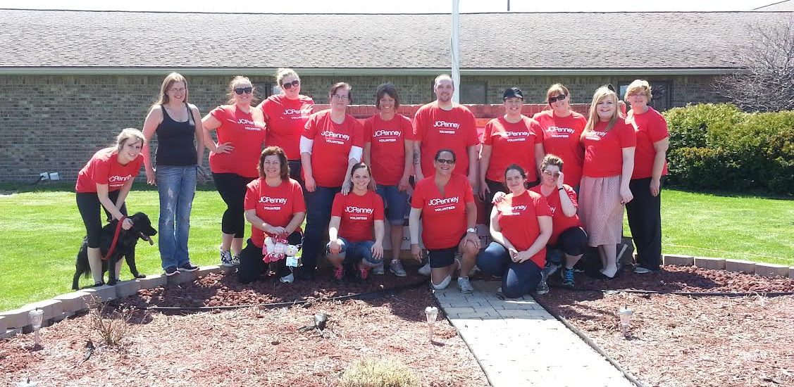 A group of people in JC Penney Volunteer Day